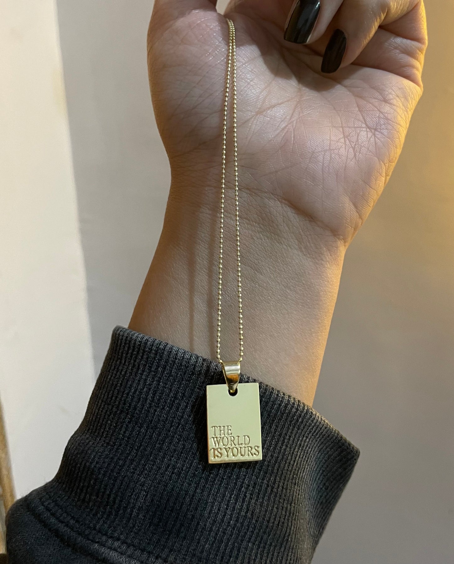 “The world is yours” necklace