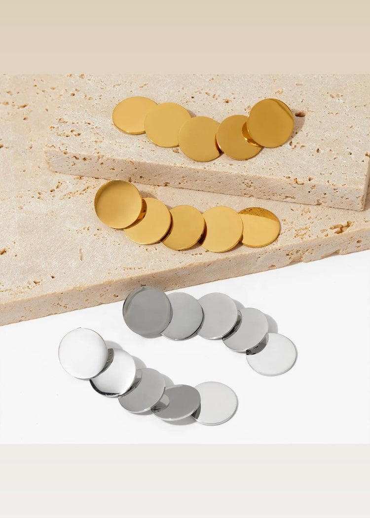 Disc drama earrings