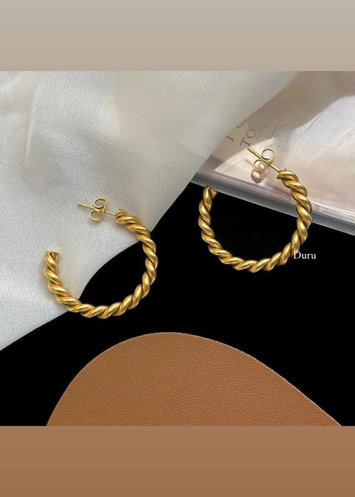 Twisted gold hoops