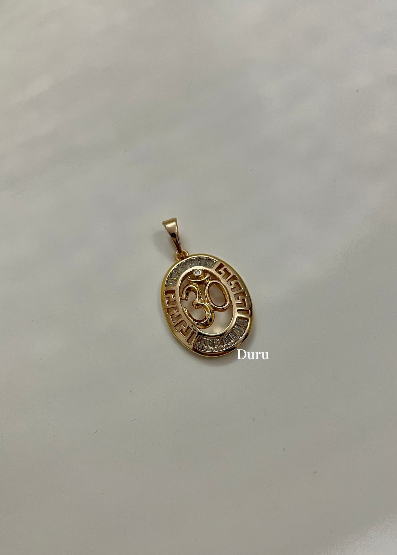 Om oval pendant