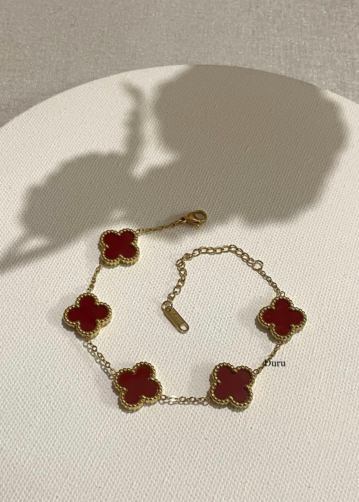 Deep red clover bracelet