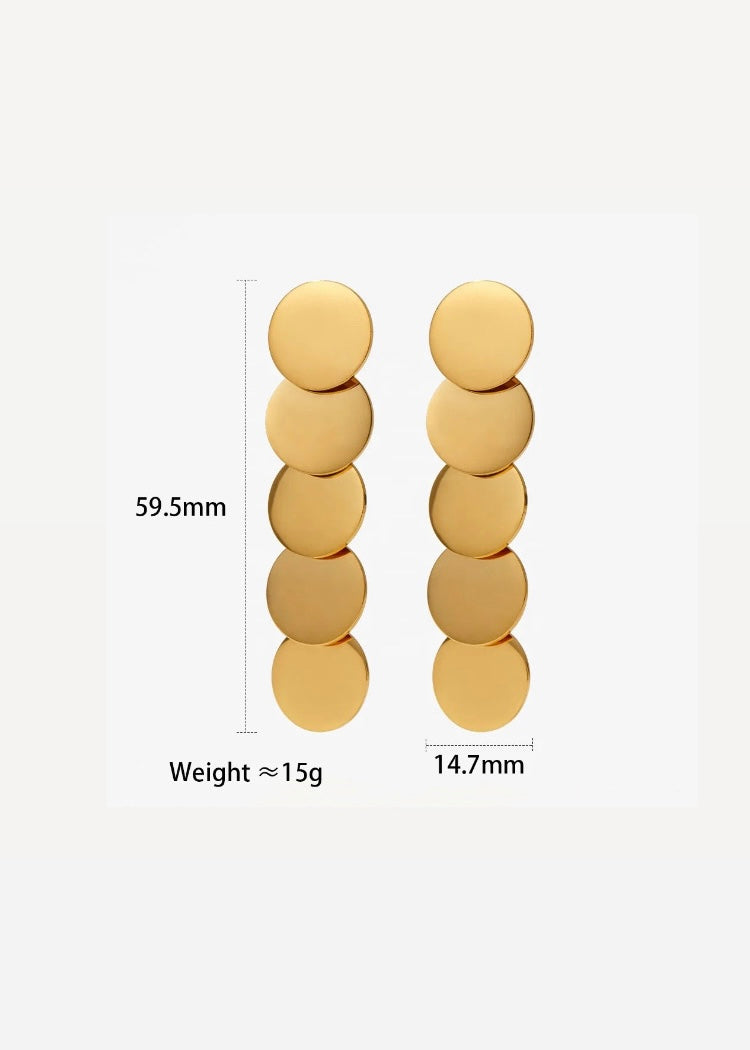 Disc drama earrings
