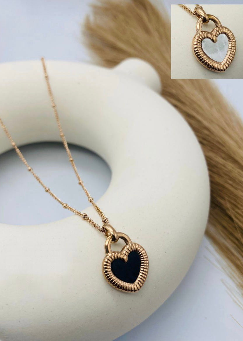 Reversible heart necklace