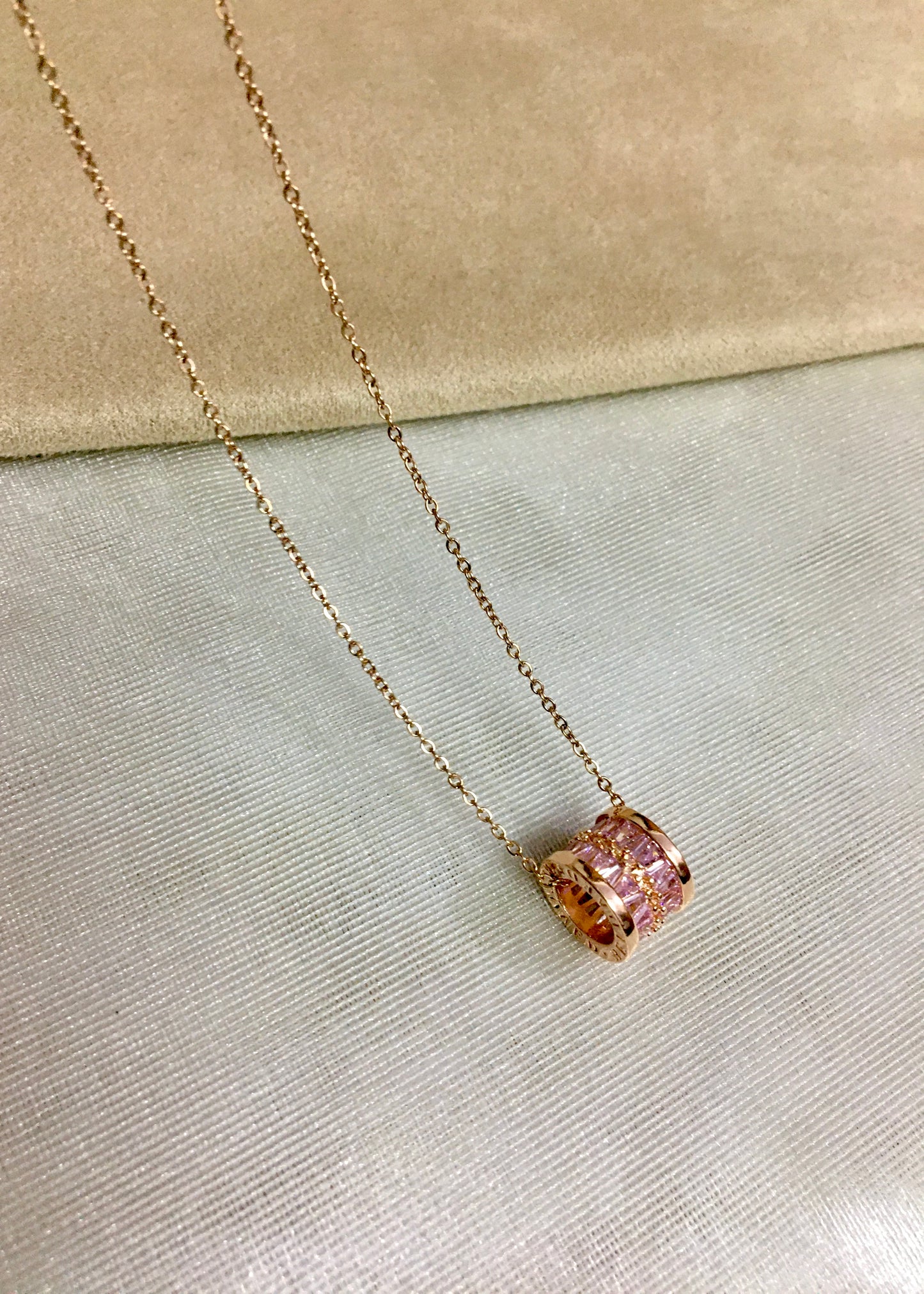 Pink orbit necklace
