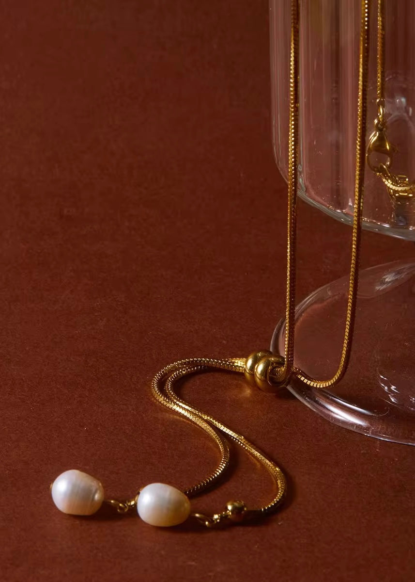 Tie-chain pearl necklace