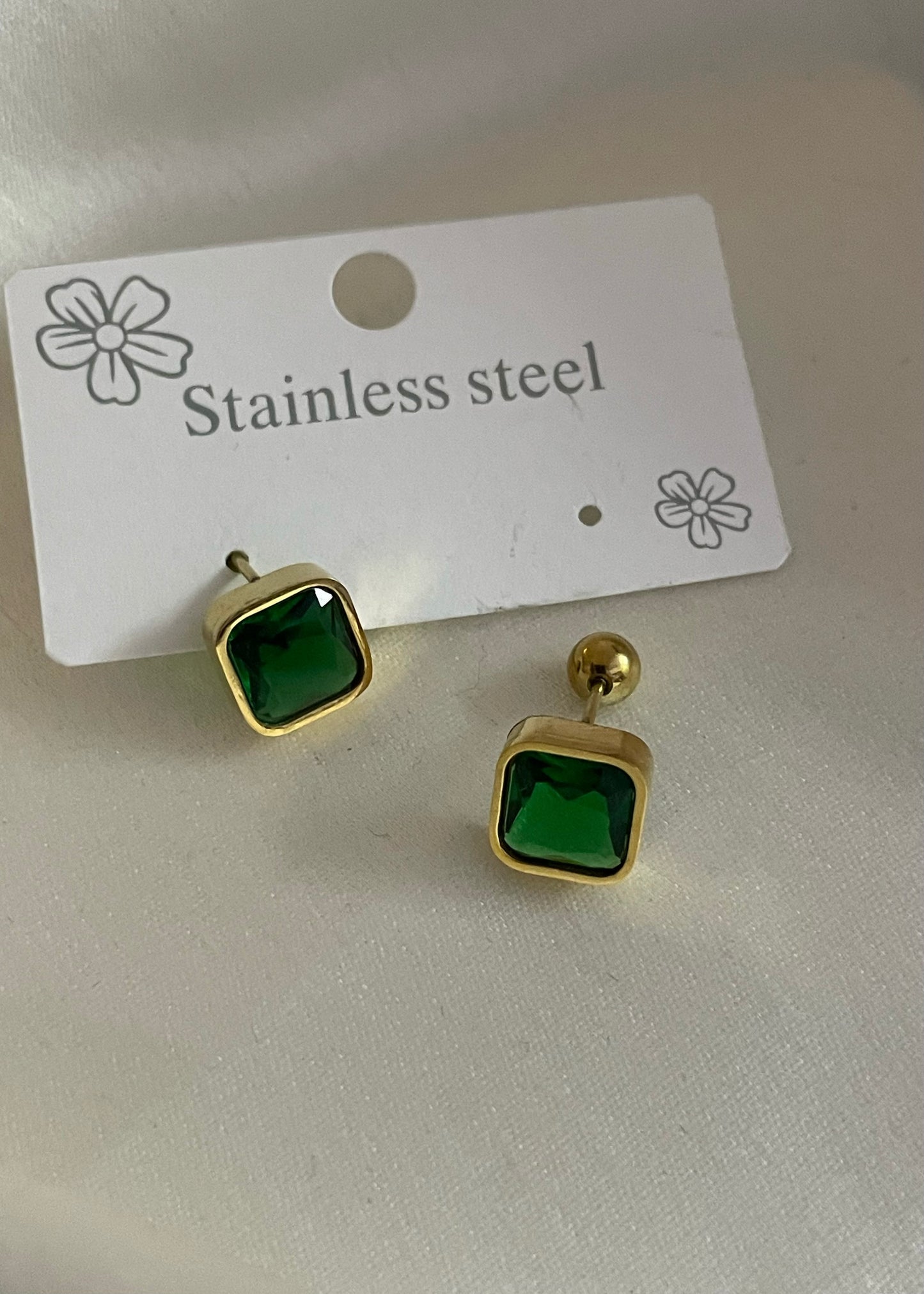 Emerald glow studs