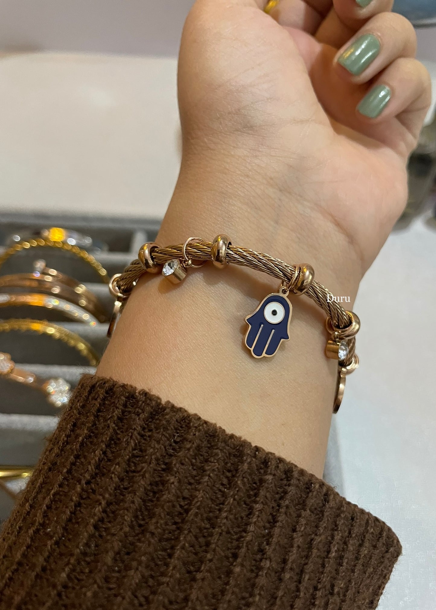 Evil eye charms cuff bracelet