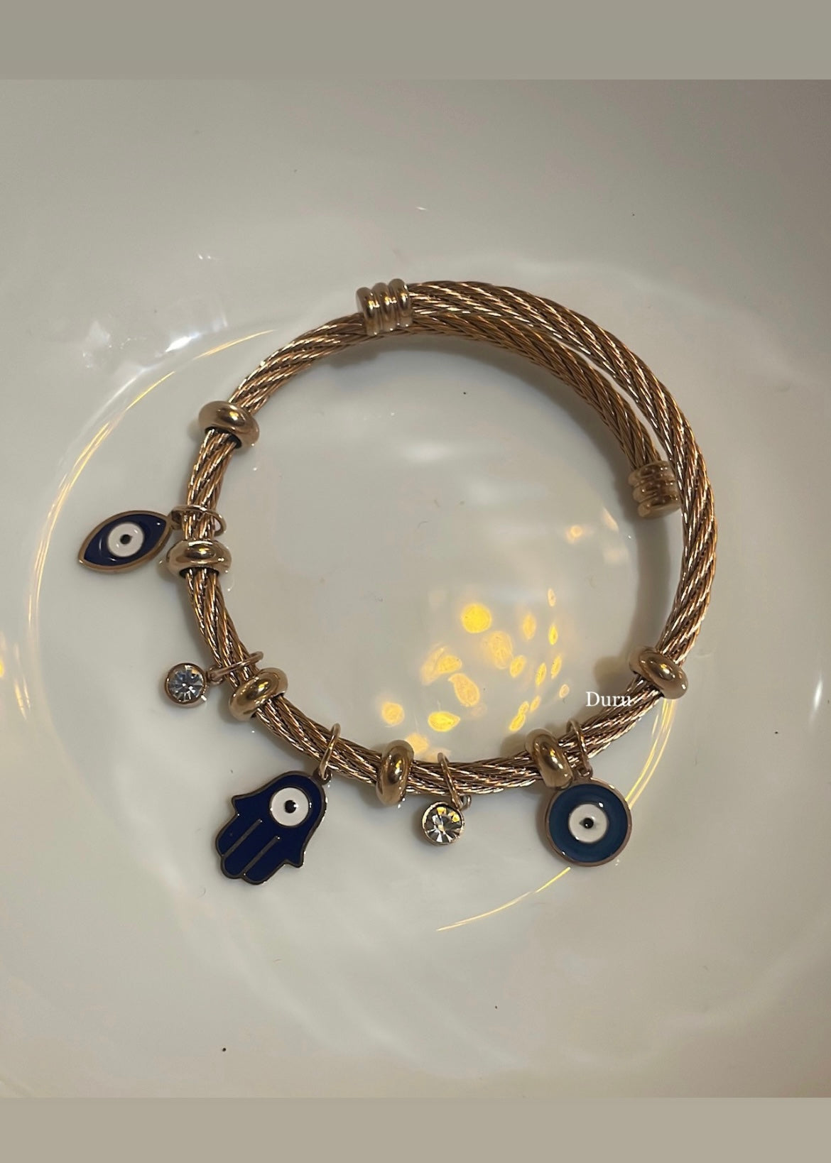 Evil eye charms cuff bracelet