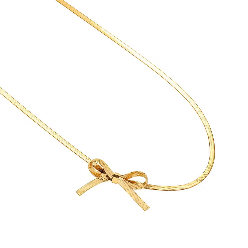 Gold bow necklace