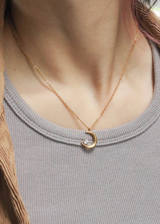 Solitaire moon necklace