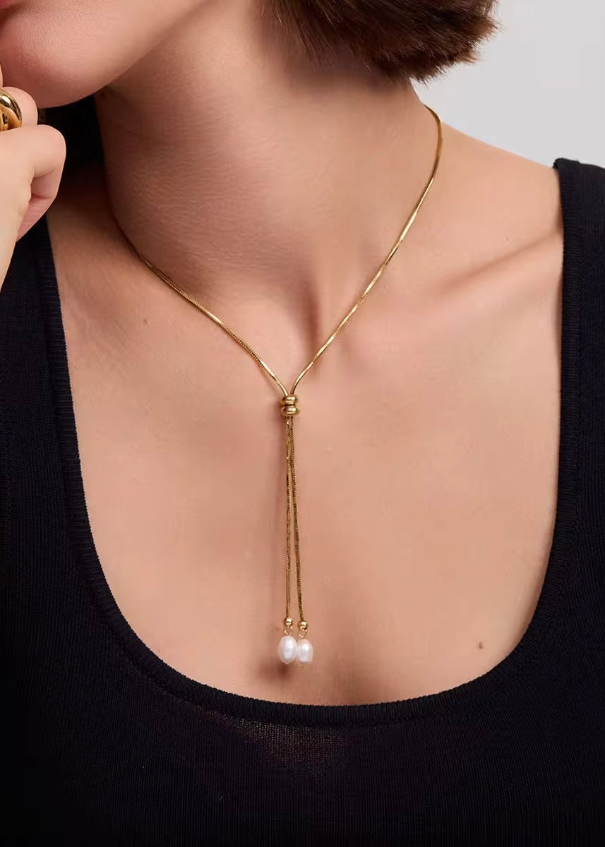 Tie-chain pearl necklace