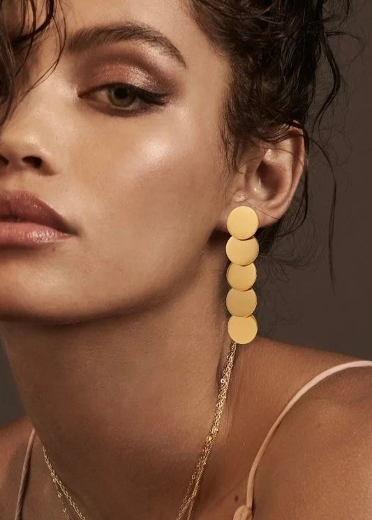 Disc drama earrings