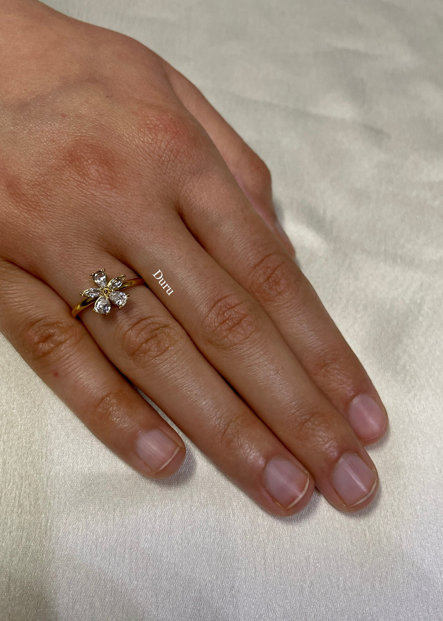 Floral solitaire ring