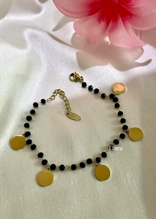 Coin charms bracelet