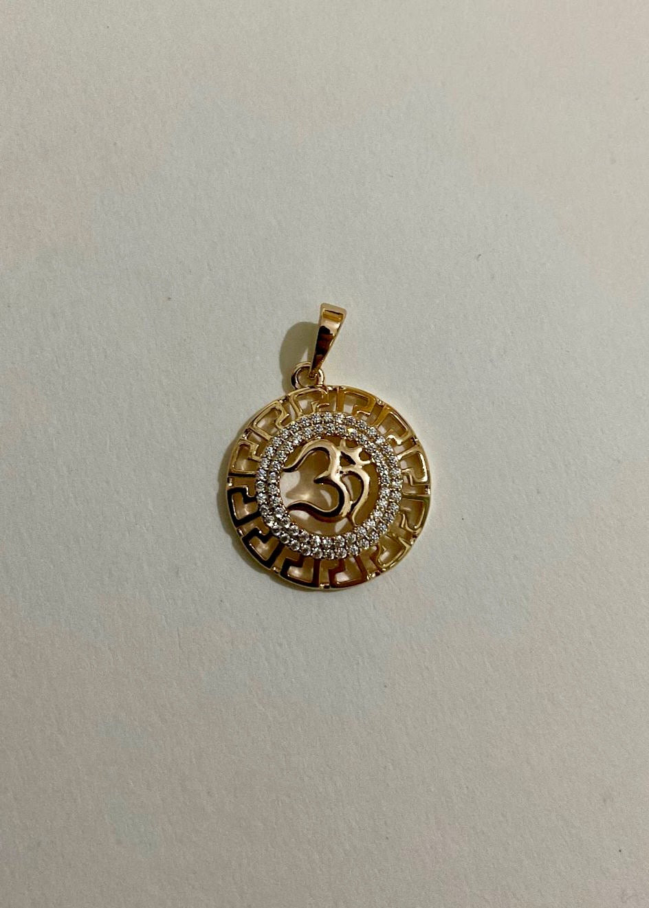 Om cosmic pendant